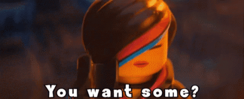 a lego girl says " you want some " while looking at the camera
