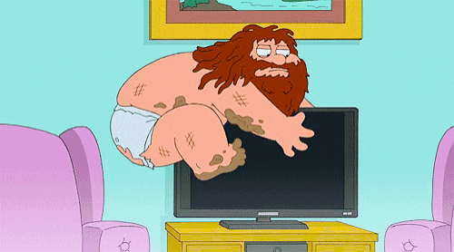 a cartoon of a man with a beard is laying on a flat screen television