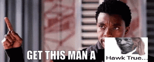 a man pointing up with the words get this man a hawk true below him