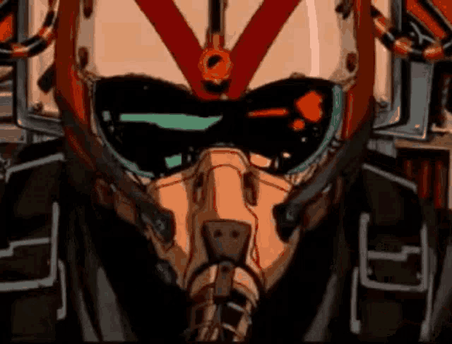 a close up of a robot wearing a helmet and goggles .