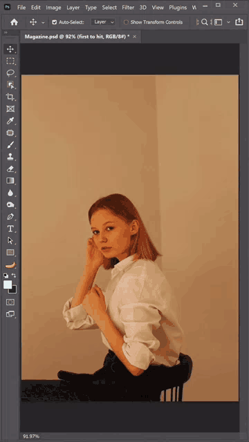 a woman in a white shirt is sitting on a stool in a photo editing program