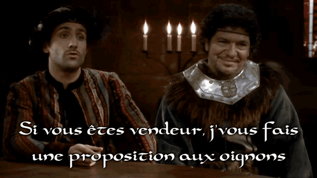 two men are sitting at a table with candles in the background and the words si vous etes vendeur jvous fais