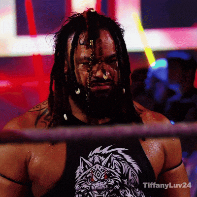 a man with dreadlocks is in a ring with tiffanyluv24 on the bottom right
