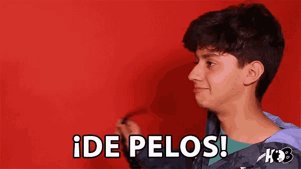 a young man is making a funny face and says ide pelos