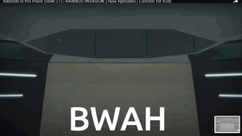the word bwah is on a screen in a room