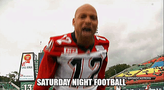a man in a red and white jersey with the number 12 on it
