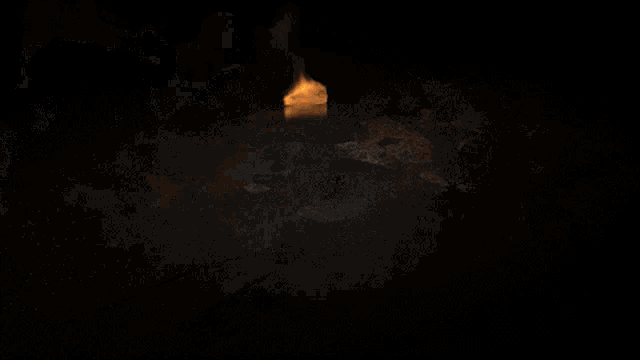 a circle of fire is surrounding a sphere with smoke coming out of it