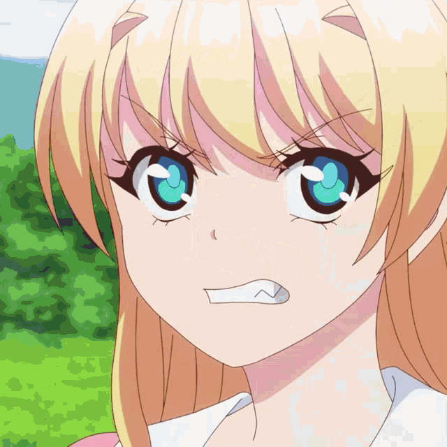 a girl with blonde hair and blue eyes is looking up