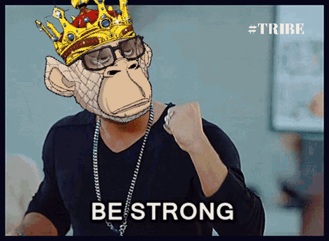 a man wearing a monkey mask with a crown on his head has the word bestrong on his fist