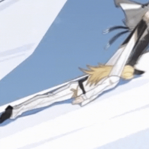 a person in a white suit is laying on a white surface with a blue sky in the background