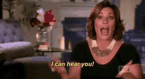 a woman is screaming and saying `` i can hear you '' .