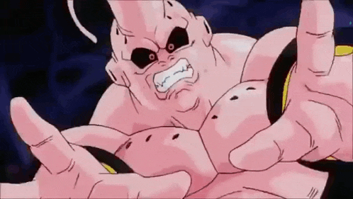 a close up of a cartoon character 's face with a mouth open and fangs .