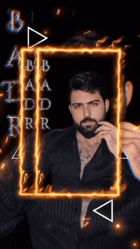 a man with a beard is surrounded by flames and the letters a b a d r r are visible
