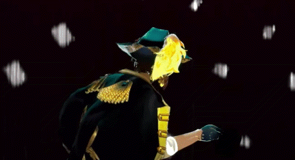 a man in a pirate costume is standing on a stage .