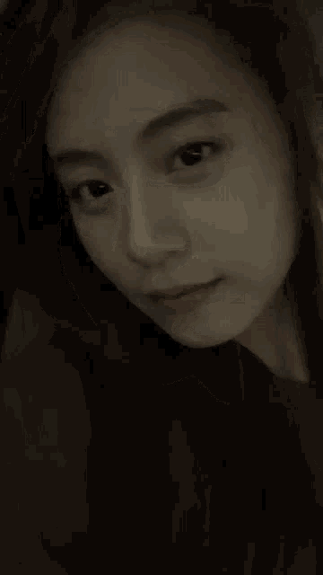 a close up of a woman 's face shows her eyes and mouth