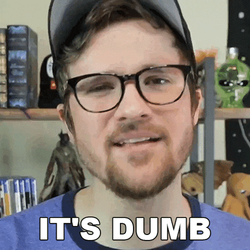 a man with glasses and a beard is saying it 's dumb