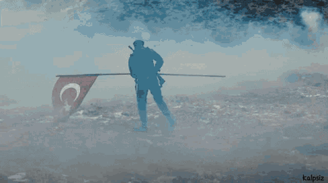 a man holding a flag with a c and a star on it