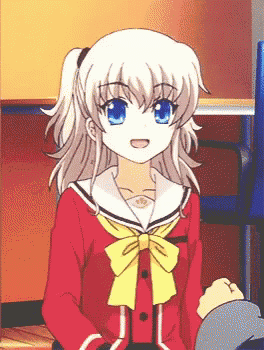 a girl with blonde hair and blue eyes is wearing a red jacket and yellow bow tie .