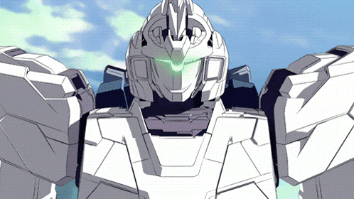 a white robot with a green light coming out of its eyes