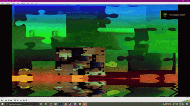 a computer screen with puzzle pieces on it and the word blocking on the bottom left