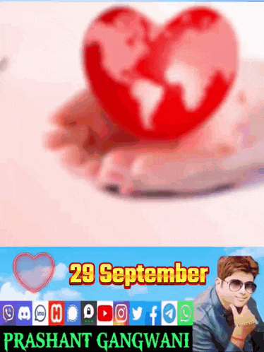 a picture of a man holding a red heart with the date 29 september