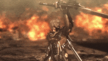 a video game character is holding a large sword in front of a fire