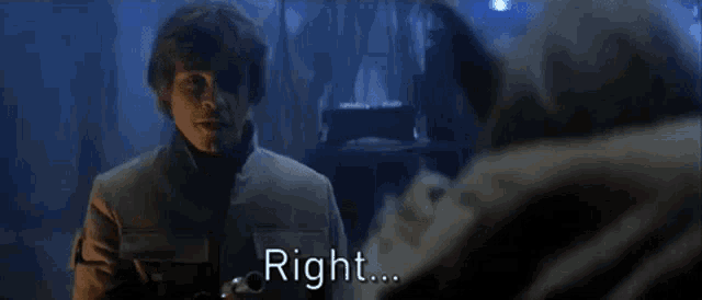 a man in a white jacket is standing next to a yoda in a dark room and saying `` right ... '' .