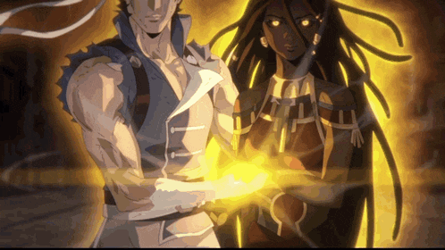 a man and a woman are standing next to each other and the man is holding something in his hand