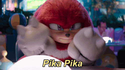 a red cartoon character with pika pika written on the bottom