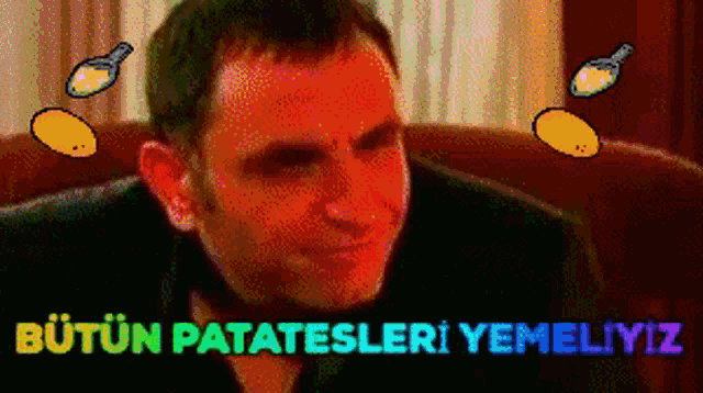a man sitting on a couch with the words " butun patatesleri yemeliyiz " written on the bottom