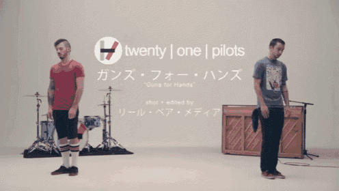 two men standing in front of a piano with the words twenty one pilots on the bottom