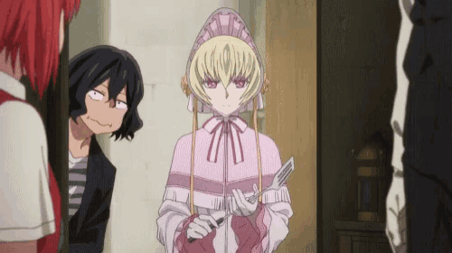 a girl in a pink dress is holding a spatula in her hand
