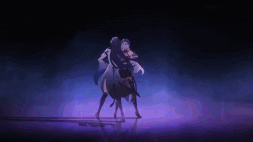 two anime characters are dancing on a stage with a purple background