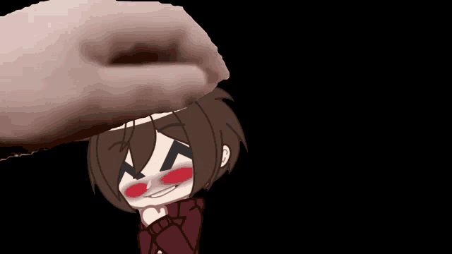 a person 's hand is reaching out to touch a cartoon character 's head