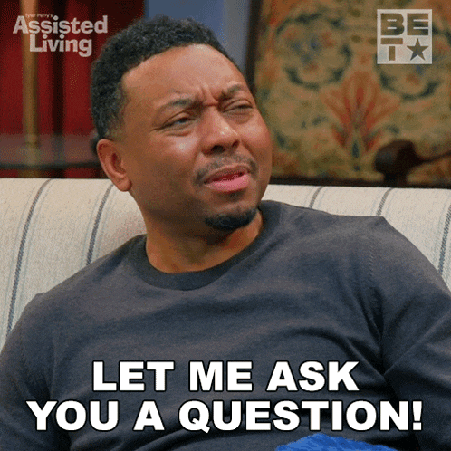 a man sitting on a couch with the words let me ask you a question