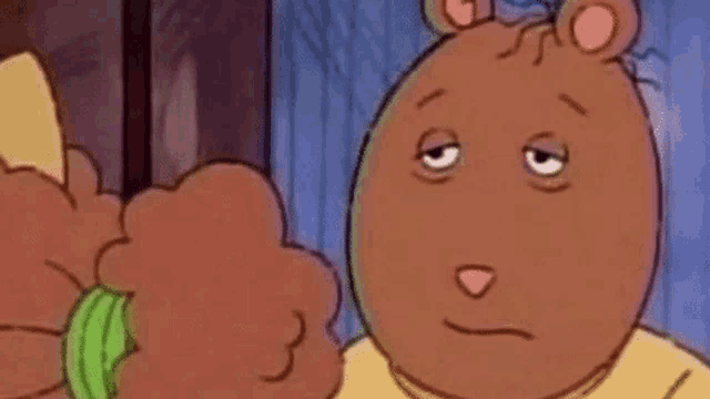a cartoon character with a tired look on his face is holding a green object in his hand .