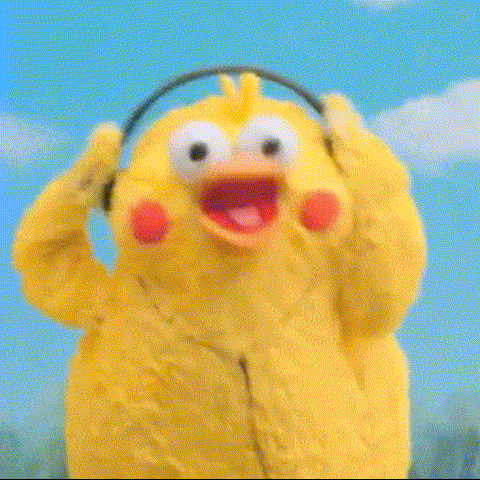 a yellow stuffed animal is wearing headphones and dancing .