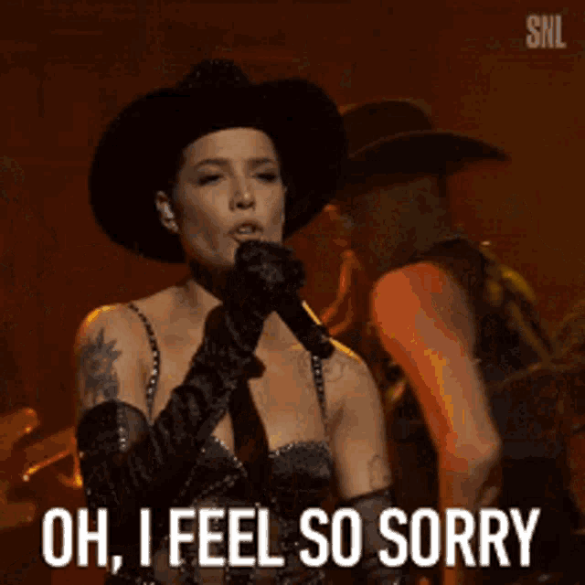 a woman in a cowboy hat singing into a microphone with the words oh i feel so sorry written below her