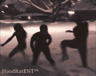 a group of people are dancing in the snow with the words hoodratent tm in the corner