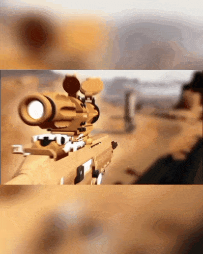 a close up of a rifle with a scope on it