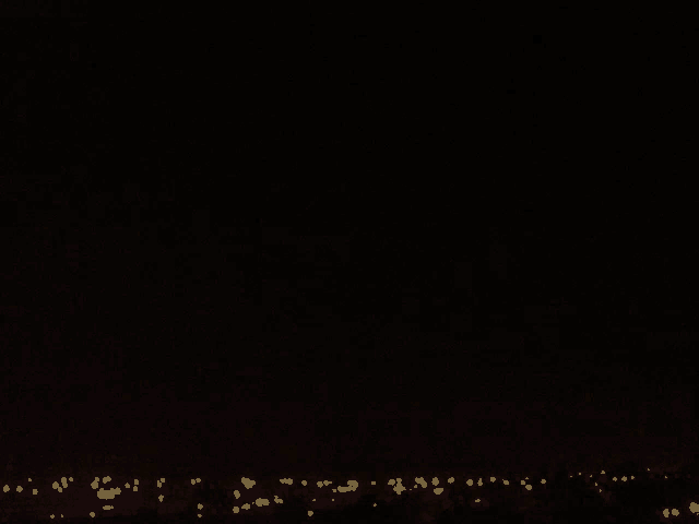 a blurred image of a city at night