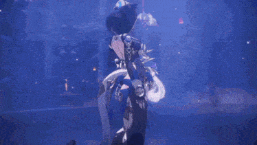 a close up of a person 's torso with a blue background