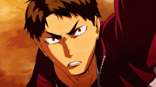 a close up of a man 's face with an angry expression