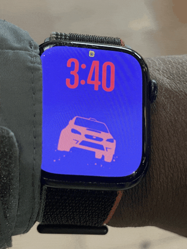 a smart watch displays the time as 3:40 on a blue background