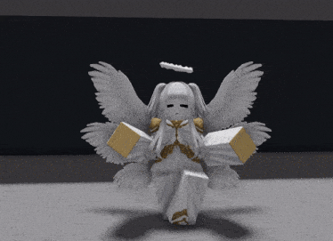 a statue of an angel with wings and a halo