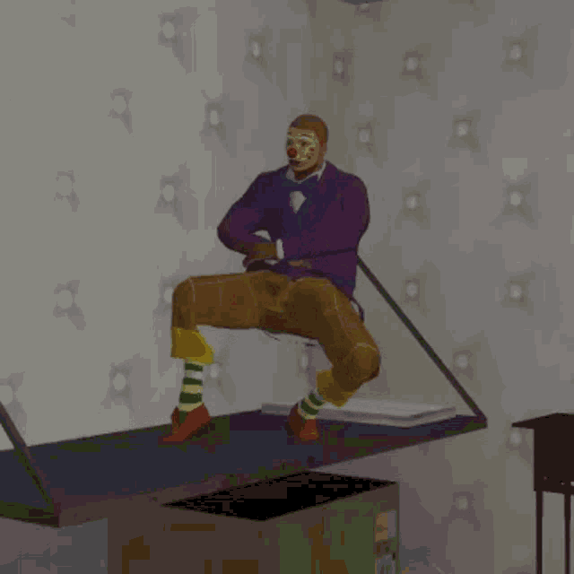 a clown in a purple suit and bow tie is sitting on a table