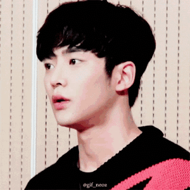 a close up of a young man 's face with the hashtag gif_neoz on the bottom