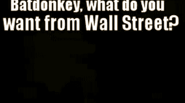 a blurry picture of a man with the words `` batdonkey , what do you want from wall street ? '' written on it .