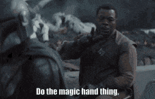 two men are shaking hands and one of them is saying do the magic hand thing .