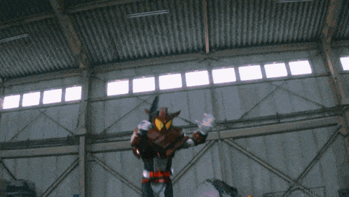a person in a robot costume is flying through the air in a building